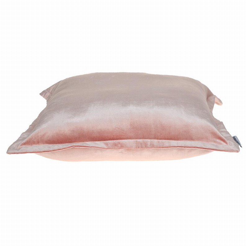 Blush pink throw pillow side view, rounded corners, soft sheen and seam detail