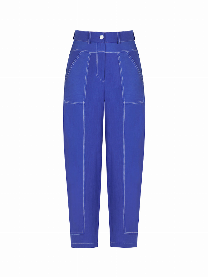 Blue linen carrot pants, close back view showing belt loops and contrast seam stitching