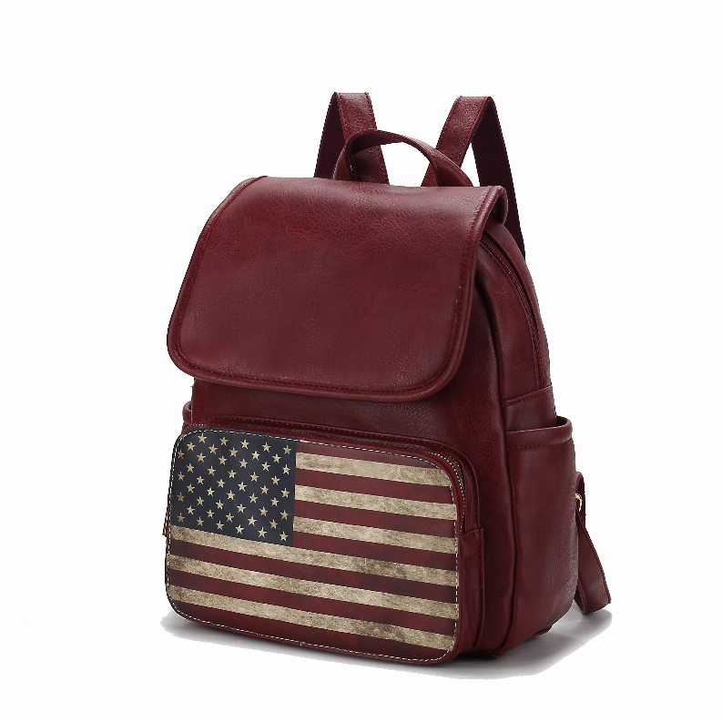 Women's maroon vegan leather backpack with flap and front U.S. flag print pocket