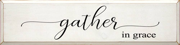 Framed wall sign with "gather in grace" lettering on light background