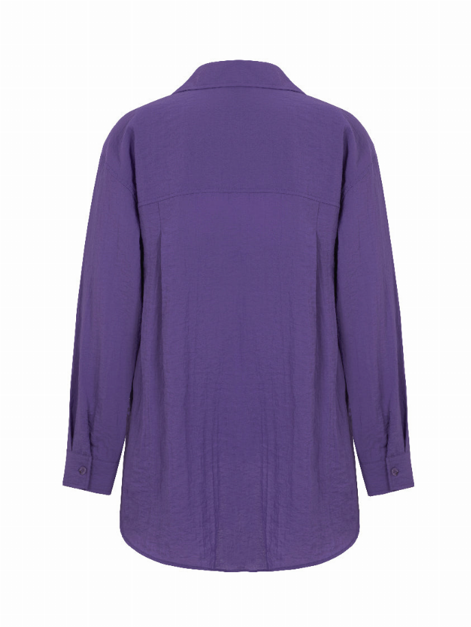 Oversized purple button-up shirt back view with curved hem and long sleeves