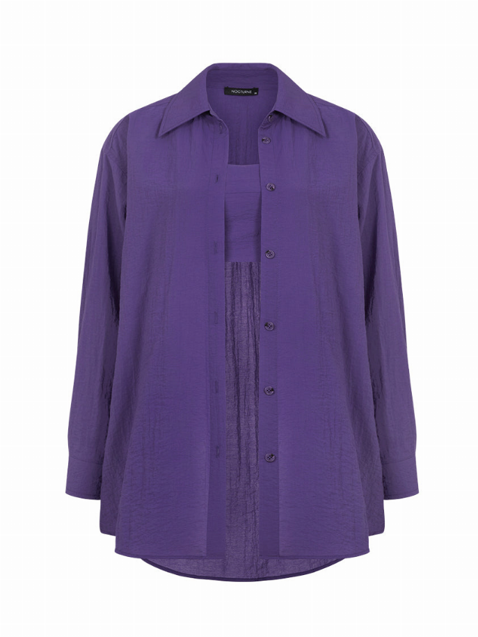 Oversized purple button-up shirt front with button placket and chest flap pockets