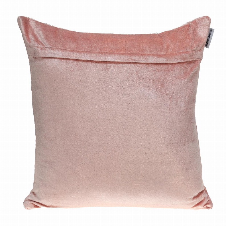 Pink velvet throw pillow back with folded top seam and hanging label