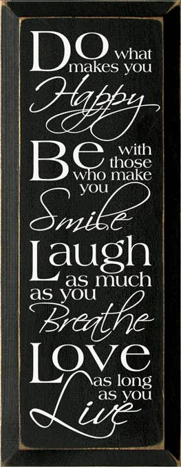 Wood wall sign with white lettering: “Do what makes you Happy… Be… Love… Live”