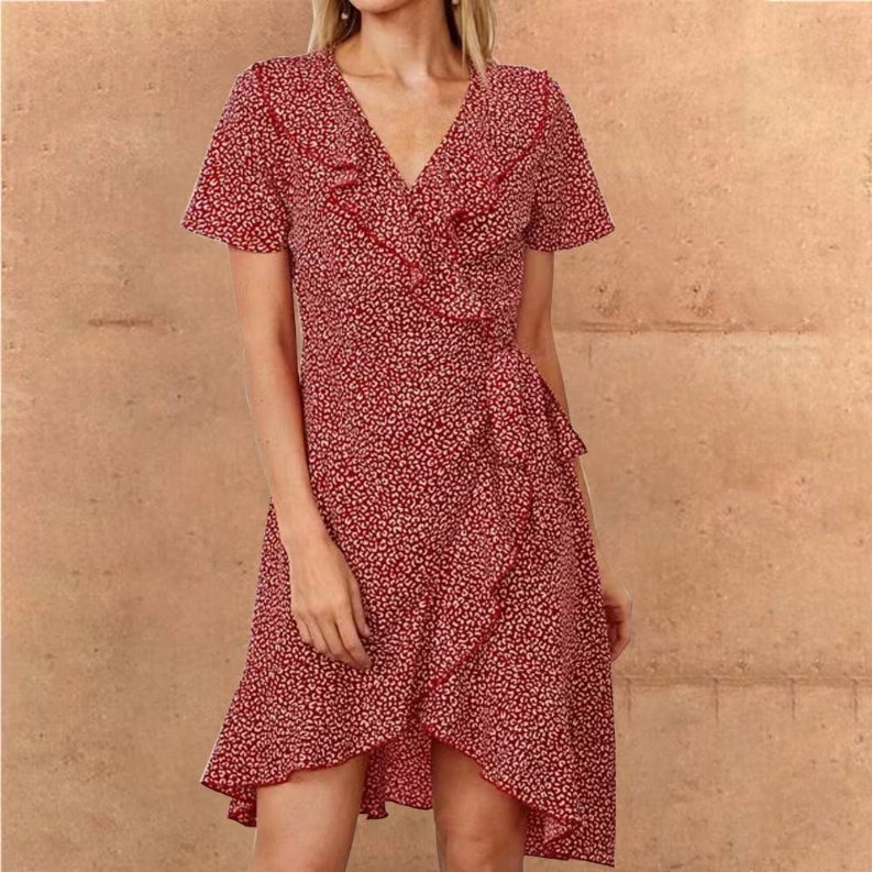 Red wrap dress with short sleeves, V-neck and ruffled asymmetrical hem