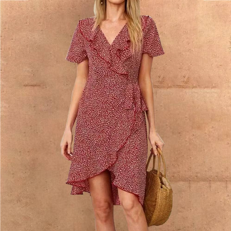 Red wrap dress with V-neck, short flutter sleeves, gathered waist and ruffled hem