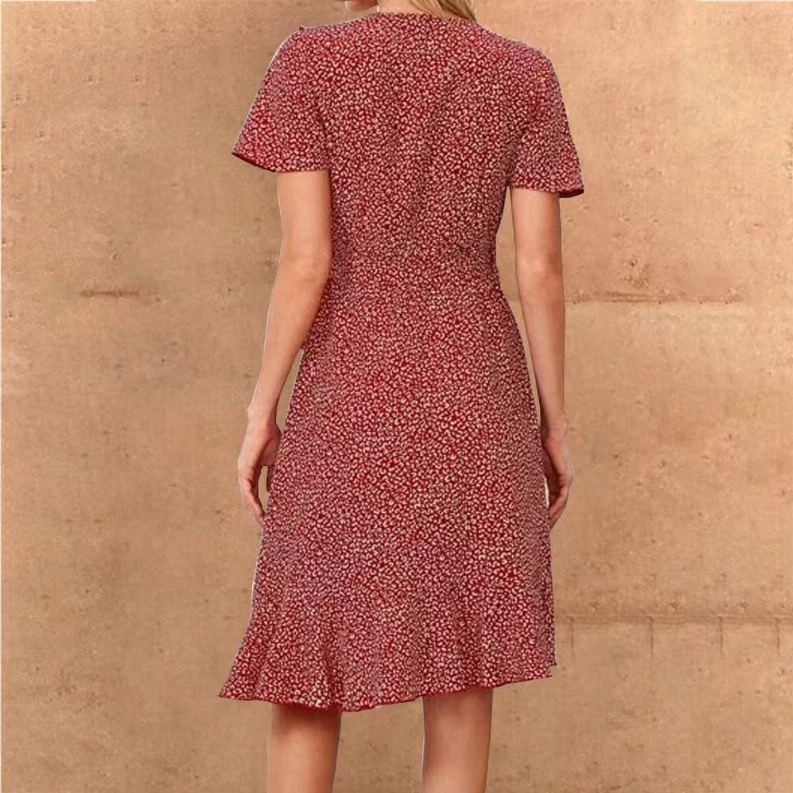 Red printed wrap dress with short sleeves, ruched back and flared ruffle hem