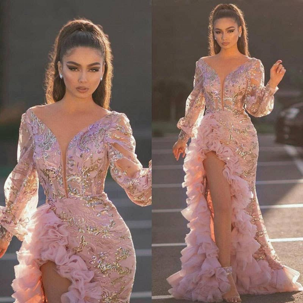 Light pink sequin cocktail dress with long sleeves, deep V neckline, ruffled skirt