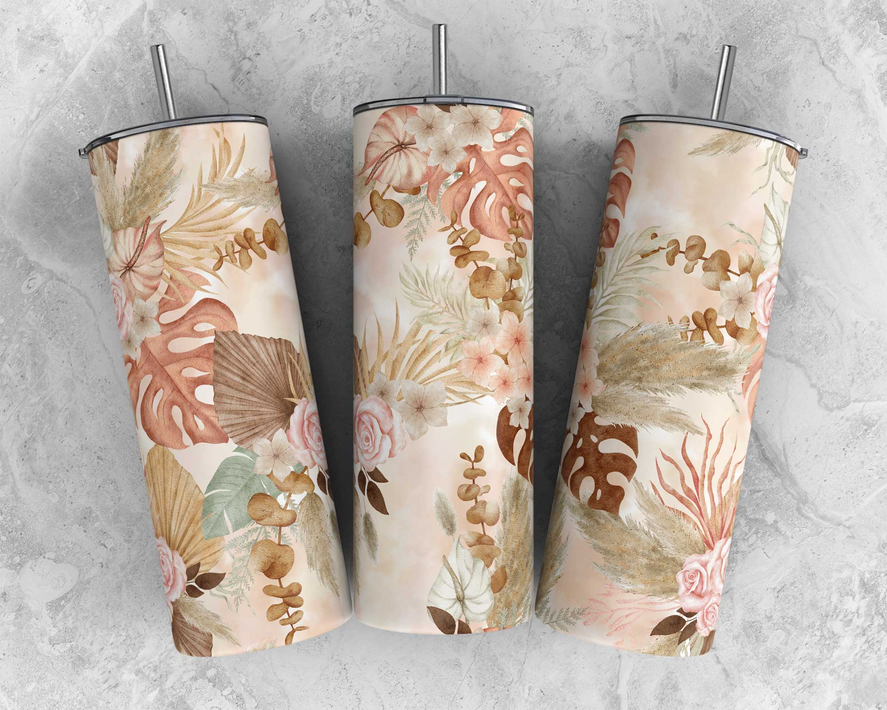 Stainless steel tumbler with lid and straw, tropical leaf and flower design.