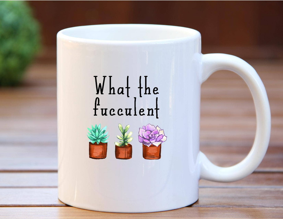White ceramic coffee mug with 'What the fucculent' lettering and three succulent illustrations