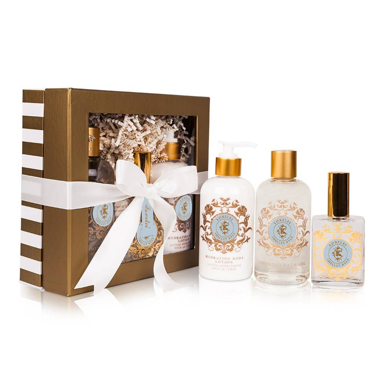 Lavender gift set with three bottles in a brown gift box, gold pump caps