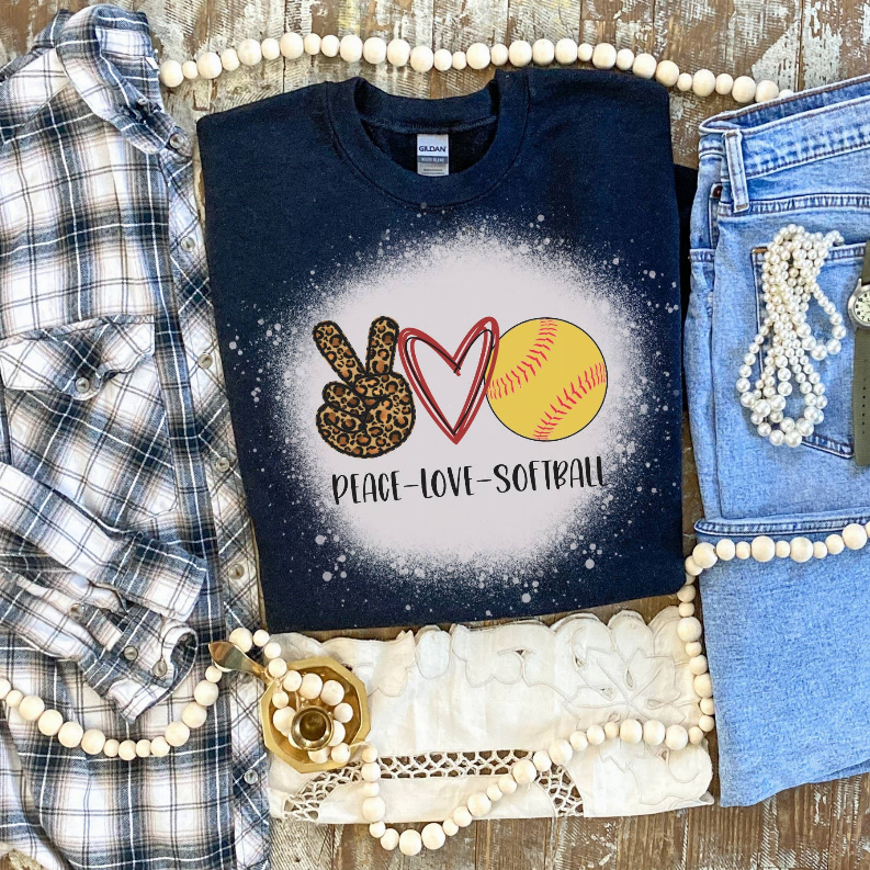 Navy speckled bleached T-shirt with Peace Love Softball heart and softball graphic