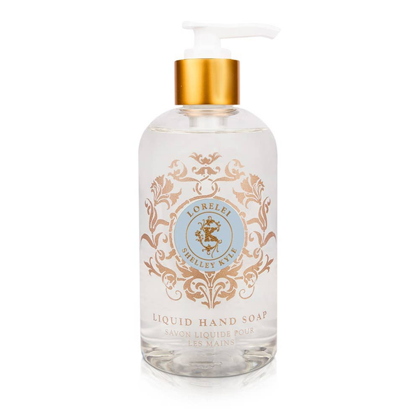 Clear liquid hand soap bottle with gold pump and lavender-themed ornate label