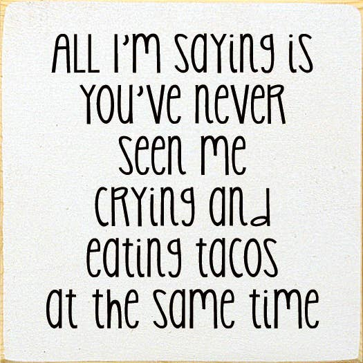 Square quote sign with black handwritten text on a light background