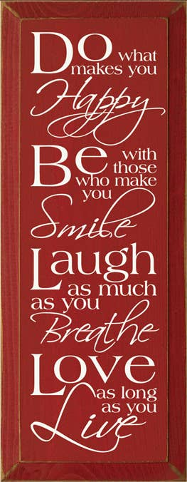 Red wood sign with white quote lettering, “Do what makes you Happy… Love.”