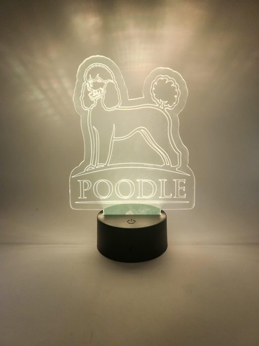 Black cylinder poodle LED lamp with glowing outline and 'POODLE' text on display