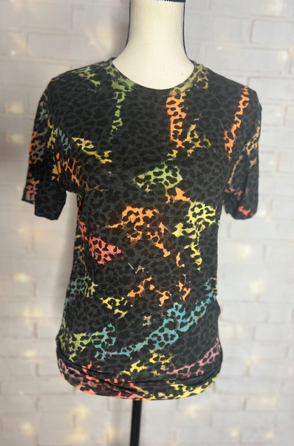 Rainbow leopard tie-dye blank tee with crew neck and short sleeves on mannequin
