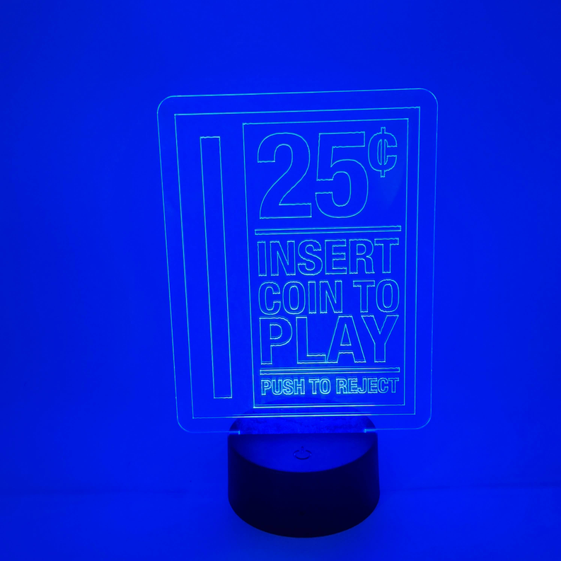 Arcade LED lamp with blue-lit “25¢ Insert Coin to Play” marquee and round black base