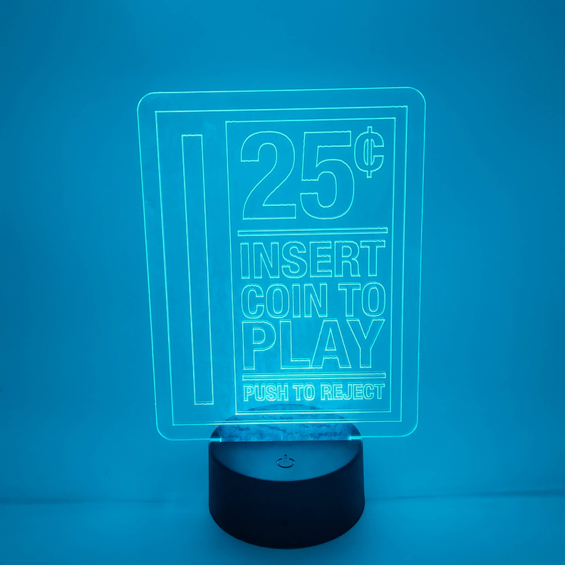 Arcade LED lamp with blue-lit “25¢ Insert Coin to Play” panel and round black base