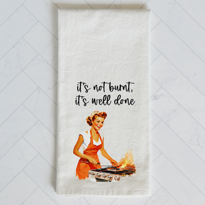 'It's not burnt, it's well done' chef print on off-white kitchen towel