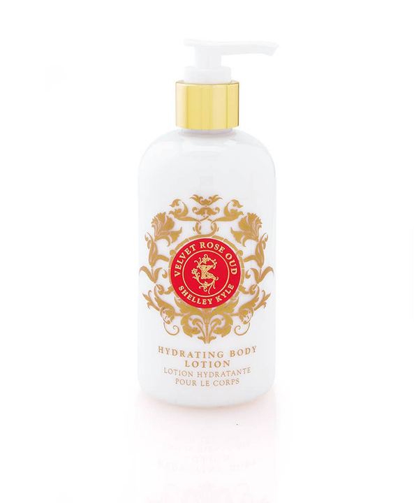 Hydrating body lotion bottle with gold pump and gold floral label, white