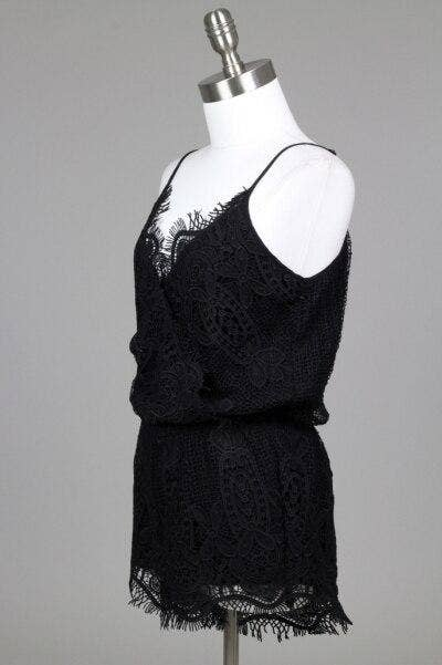Bellavie black lace romper on mannequin, spaghetti straps and fringed hem