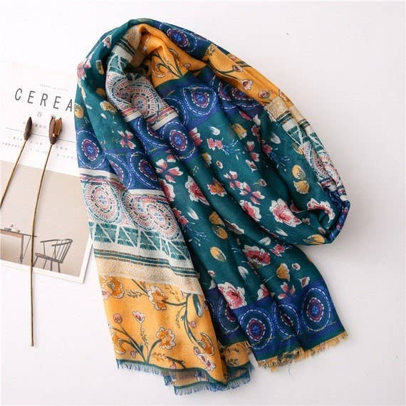 Looped handmade scarf in teal and mustard with floral and circular medallion prints, fringed ends