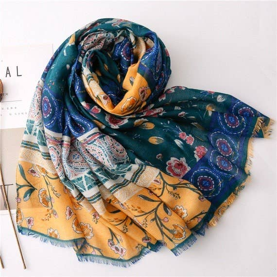Draped handmade scarf with teal, mustard, floral prints, circular medallions, fringed ends