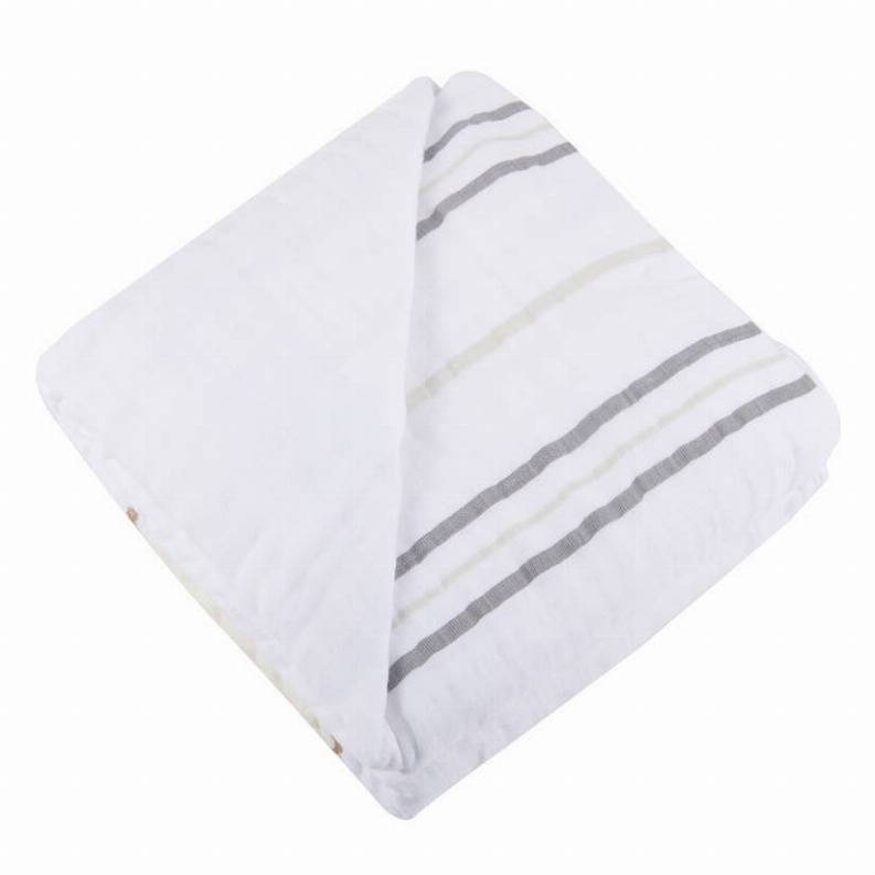 White baby blanket with gray and muted green striped border, neatly folded