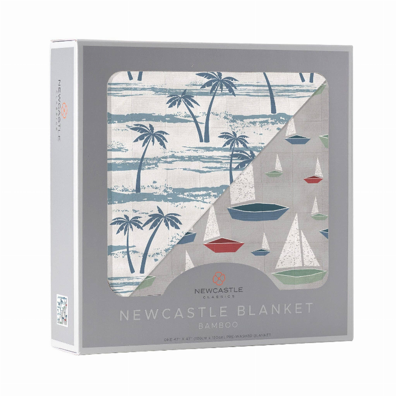 Bamboo blanket gift box with ocean palm and sailboat design behind clear window