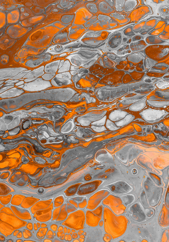 Close-up marble glass wall art with orange and gray bubbly, marbled pattern