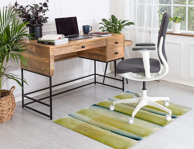 Low pile area rug with rectangular abstract green, blue, and gold stripe motif