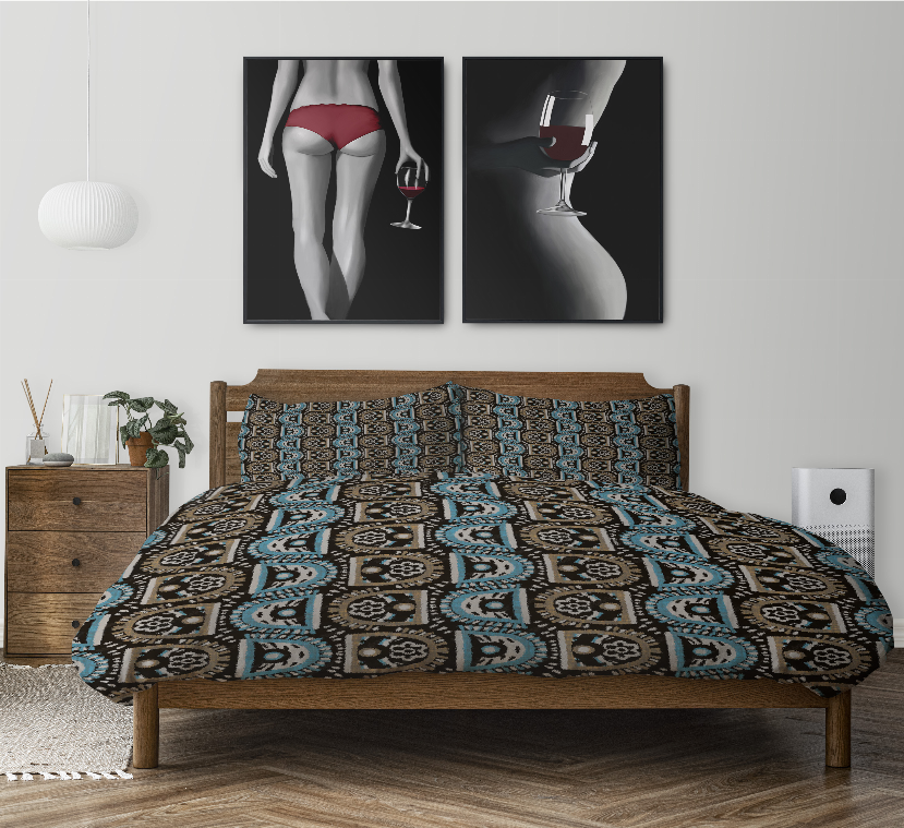 Comforter set with geometric blue and black print on comforter and bed pillows