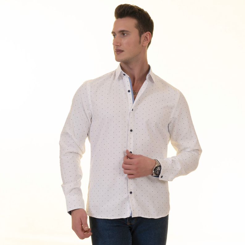 White dotted button-up shirt on model, long sleeves, center-front dark buttons