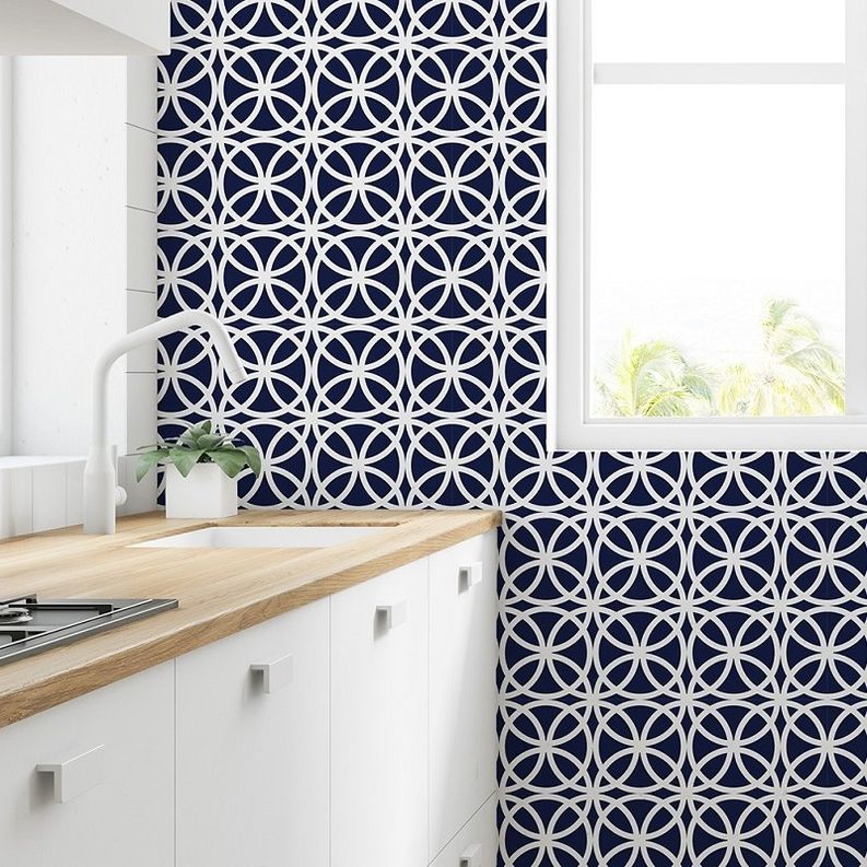 Peel-and-stick wallpaper panel with navy background and repeating white linked medallions