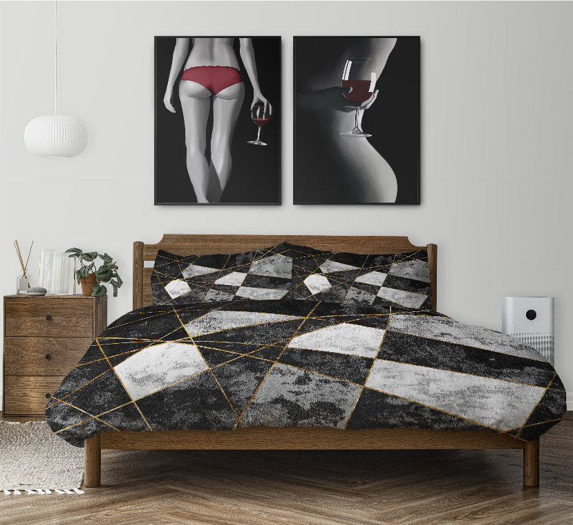 Geometric comforter set in black, white and gold with two matching shams