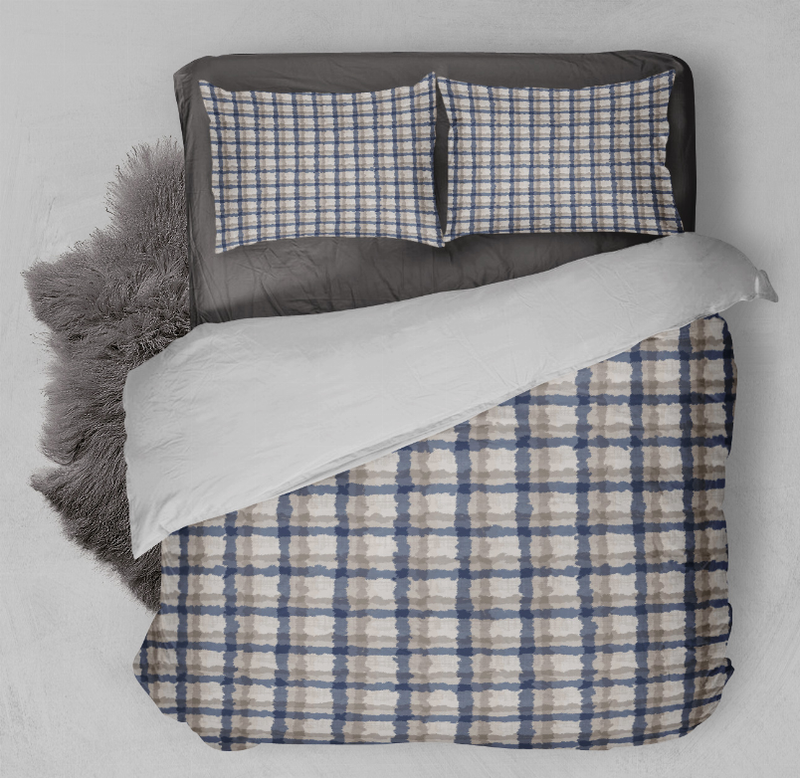 Blue plaid comforter set with two pillow shams and quilted grid cover