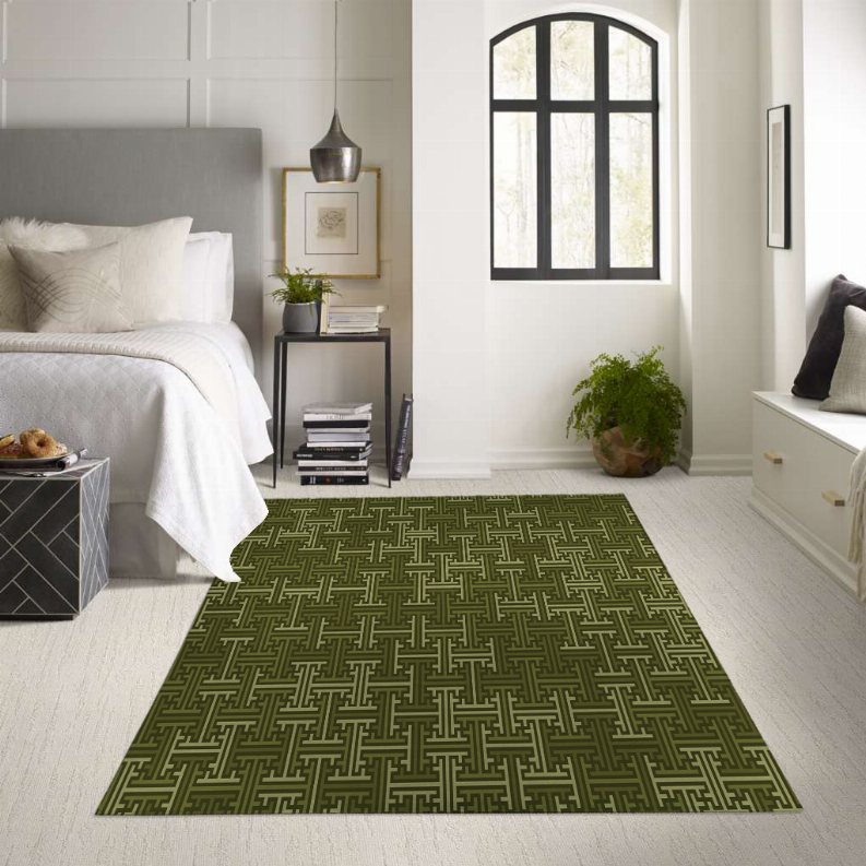 Low pile green geometric rug with repeating maze pattern
