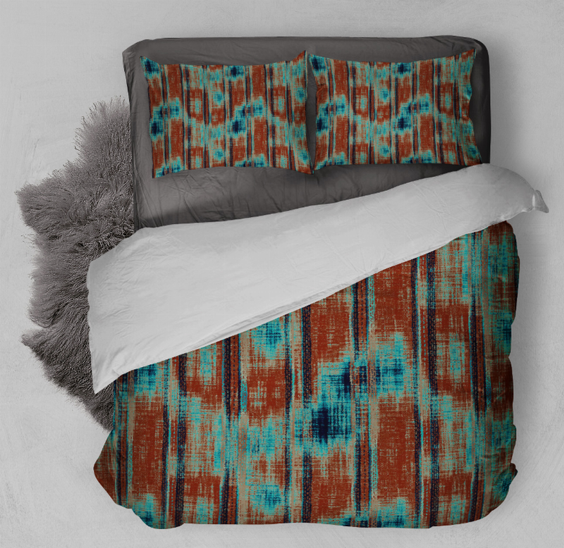 Multi-color abstract duvet cover with matching pillow shams, shown at an angled close view