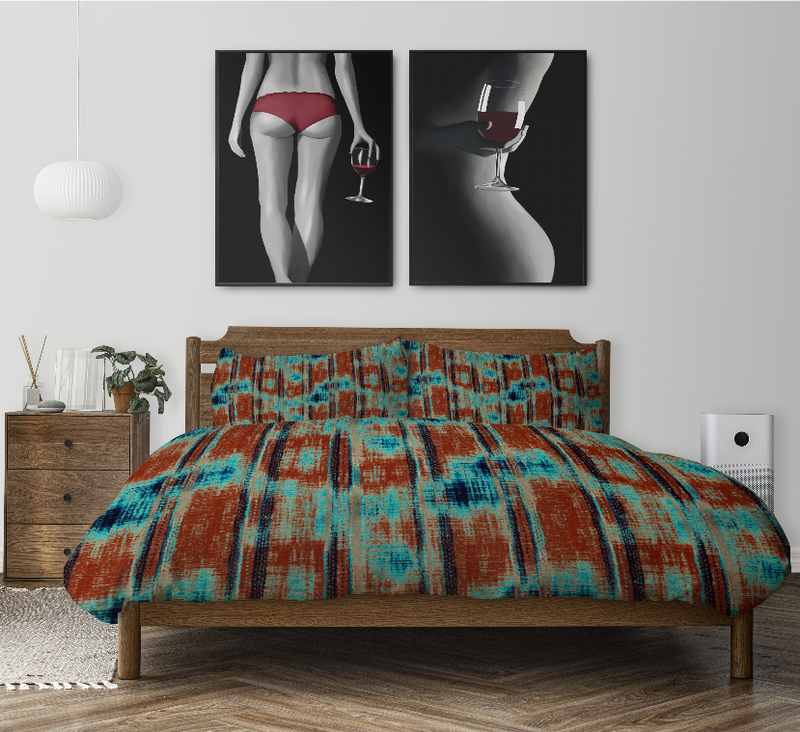 Multi-color abstract duvet cover set with two pillow shams on a wooden bed frame