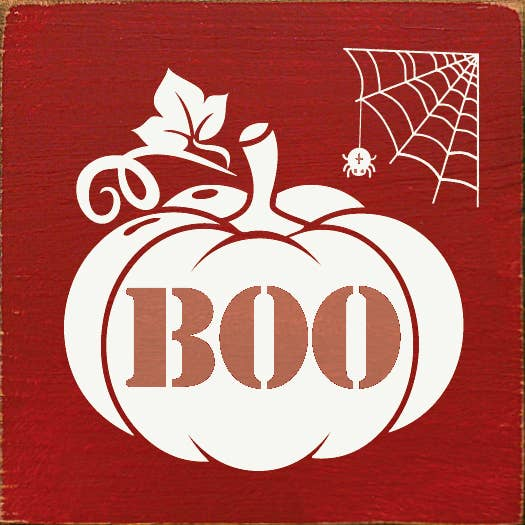 Boo graphic card in old red with white pumpkin face and spider web