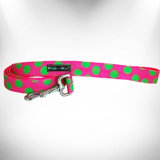 Neon pink dog leash with green polka dots, chrome clip, and logo tab