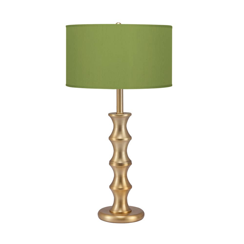 Bamboo table lamp with brushed brass base and green fabric drum shade