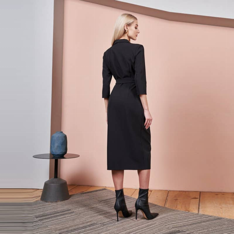 Black wrap midi dress with belt at waist and three-quarter sleeves, rear view