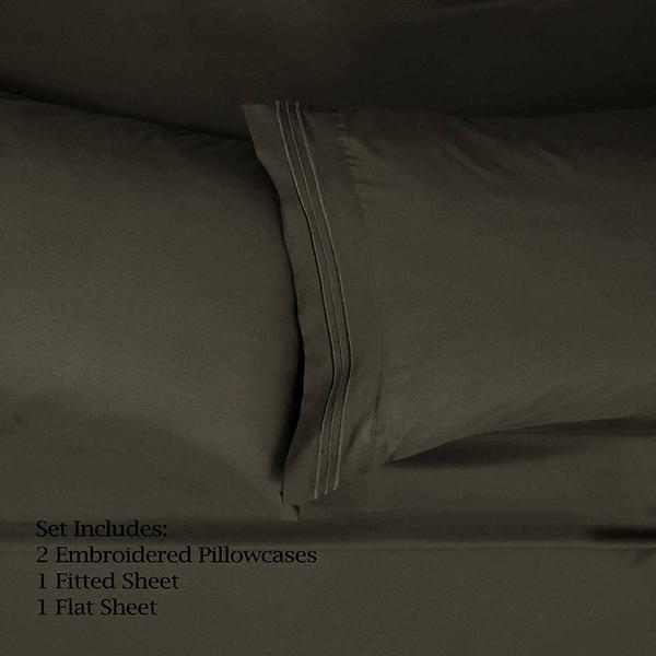 Brown fitted sheet corner with elastic seam and stitched edges