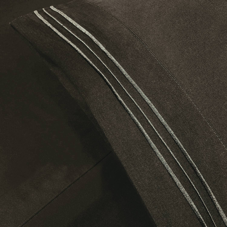 Brown pillowcase with decorative double-stitched stripe along the edge