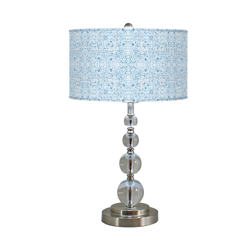 Savannah table lamp with blue patterned drum shade and reflective metal base