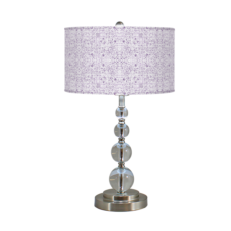 Table lamp with purple speckled drum shade and polished chrome globe base