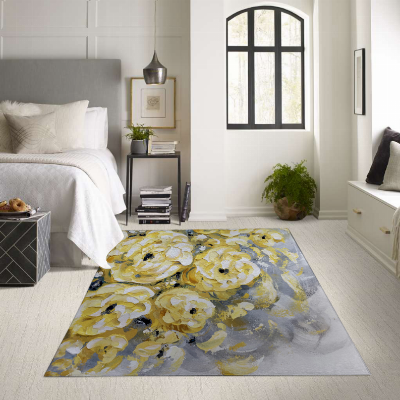 Low pile carpet rug with yellow floral motifs and gray background