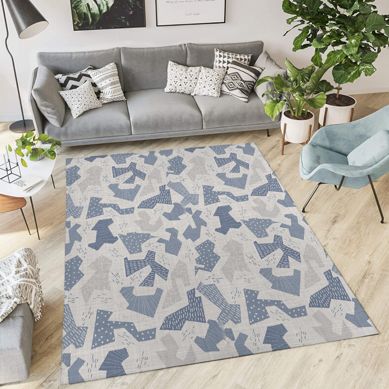 Low pile carpet rug with blue and gray geometric pattern in living room